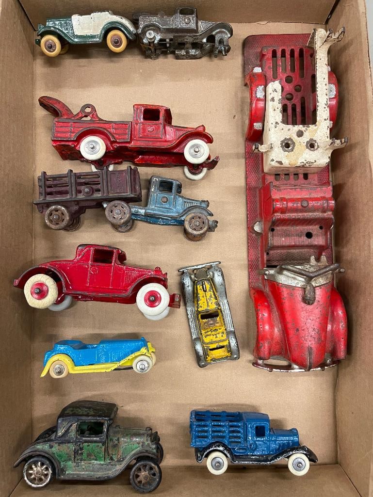 Hubley cast iron fire truck, cars and more: Hubley cast iron fire truck, cars and more. 10 pieces.
