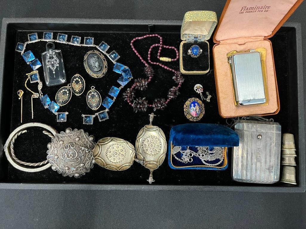 Mixed group of costume jewelry, lighters, thimbles and more: Mixed group of costume jewelry, lighters, thimbles and more. Approx 25 pieces.