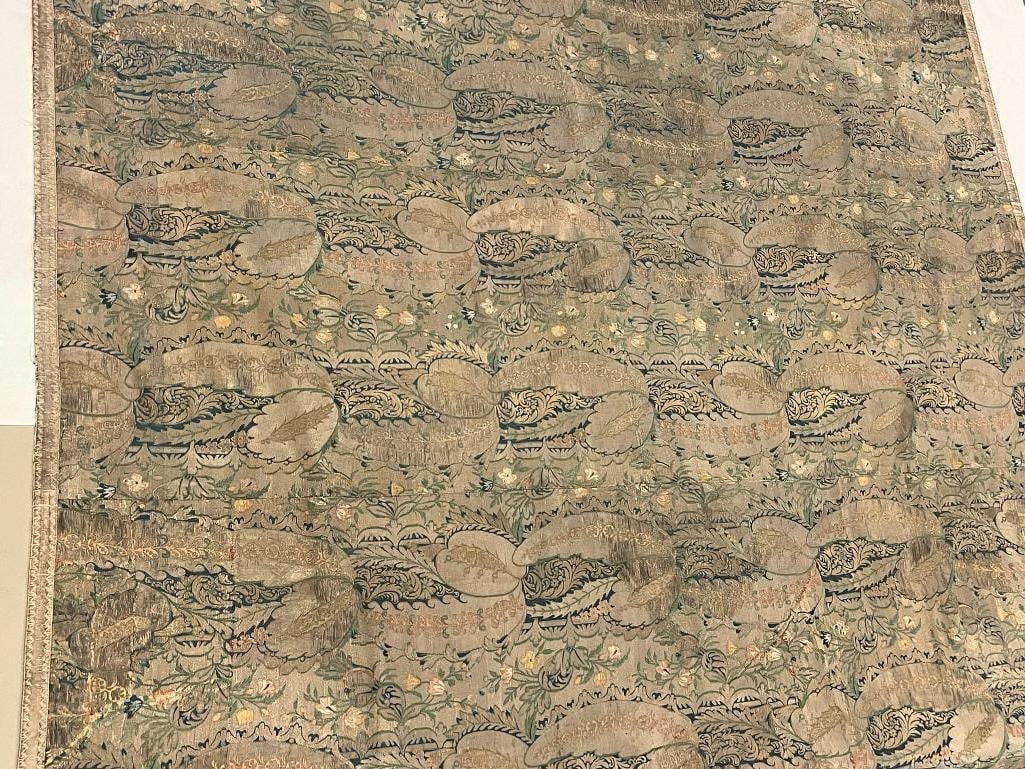 Silk Italian wall hanging: Italian wall hanging with brocaded brocatelle lampas and silver metallic thread. Deaccession from Memorial Art Gallery, Rochester NY. Sold to benefit the collection. Approx. 72x63 inches.