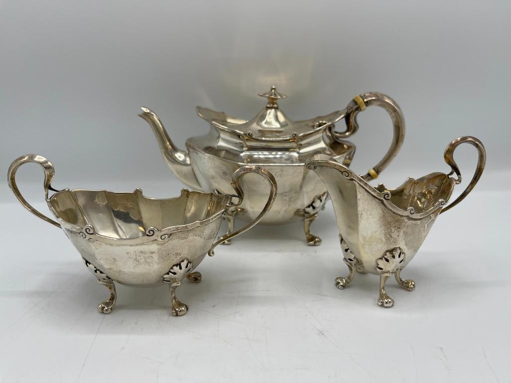 Asprey London sterling teapot, cream and sugar: Asprey London sterling teapot, cream and sugar. 3 pieces. Approx. 23oz.