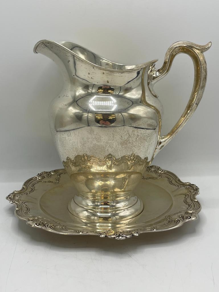 Gorham pitcher and plate: Gorham pitcher and plate. 2 pieces. Approx. 9x9x6. Approx. 33oz.