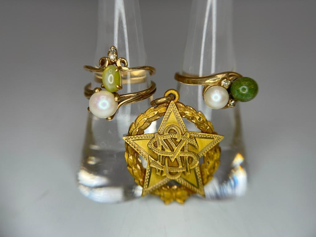 10k gold rings and pendant: 10k gold rings and pendant. 3 rings, 1 pendant. Approx. 10.4 grams.