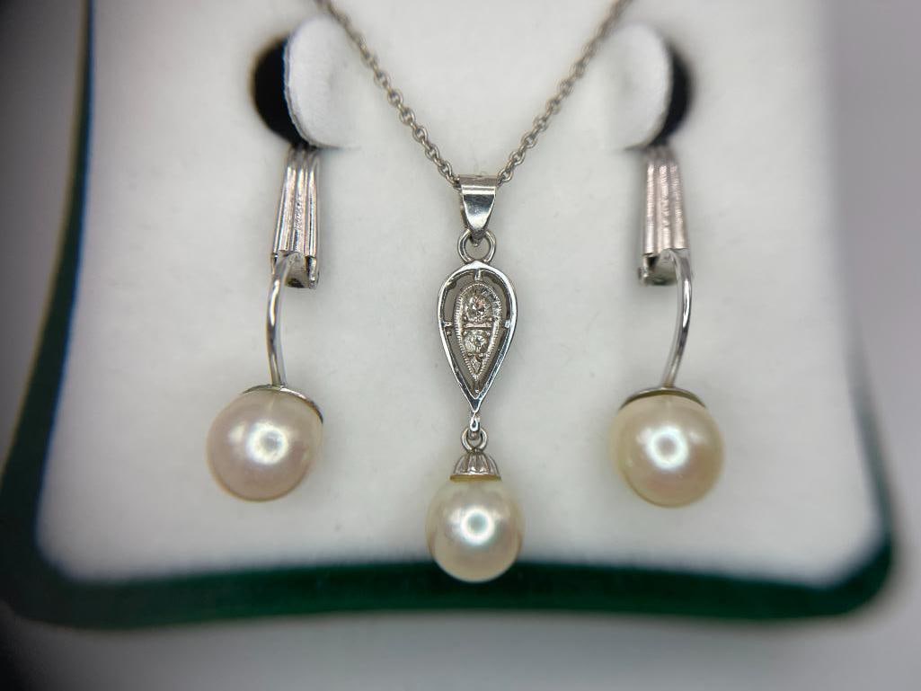 14k Pendant and earrings with diamonds and pearls, sterling necklace: 14k Pendant and earrings with diamonds and pearls. Necklace is sterling. 3 pieces.