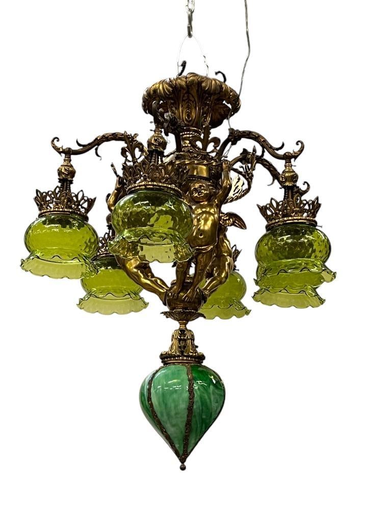 6 arm bronze chandelier with Cherubs and green shades: 6 arm bronze chandelier with Cherubs and green shades. Approx. 36x26x26 inches.