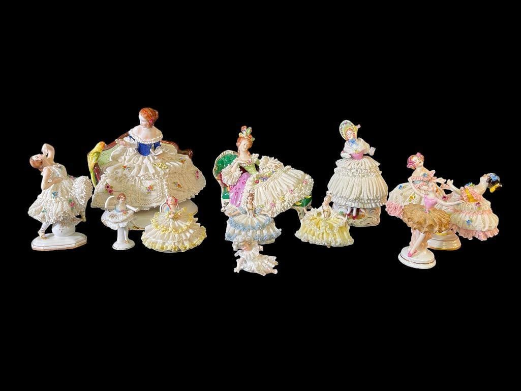Group of 11 porcelain Dresden style figures: Group of 11 porcelain Dresden style figures. Largest approx. 8x8x6 inches.