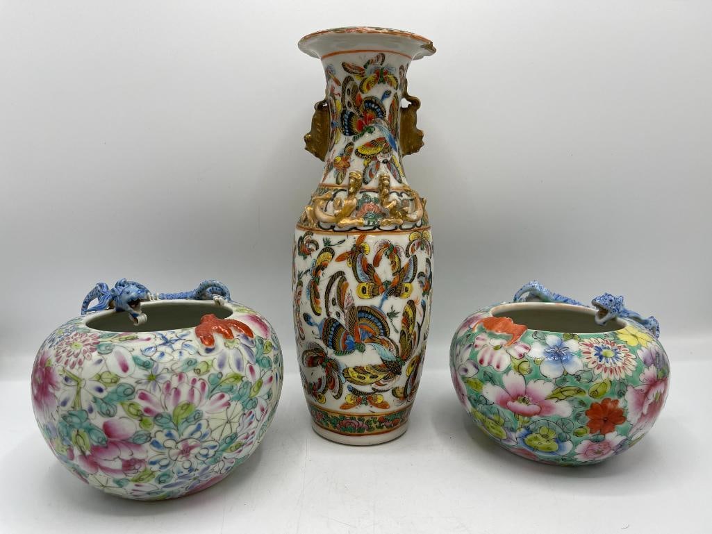 Chinese raised dragon and bat vases and butterfly vase: Chinese raised dragon and bat vases and butterfly vase. 3 pieces. Butterfly vase approx. 10x4x4 inches.