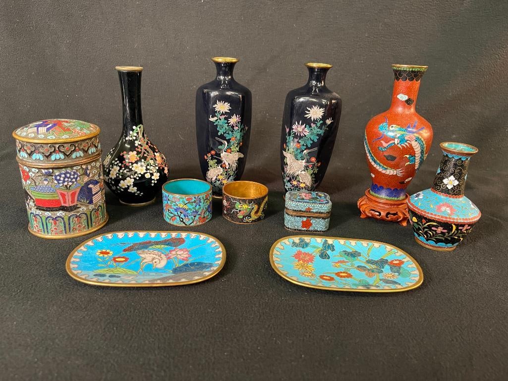 Group of cloisonne vases, trays, napkin rings and more: Group of cloisonne vases, trays, napkin rings and more. Approx. 11 pieces. Vase approx. 6x3x3 inches.