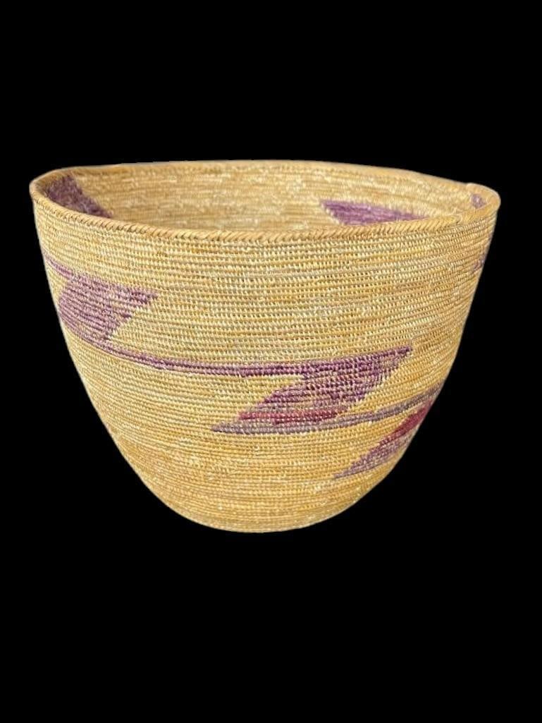Native American basket with Purple color design: Very finely woven Native American basket with Purple color design. Approx. 5.5x7.5x7.5 inches.Provenance: From the Monte Hoffman Collection.