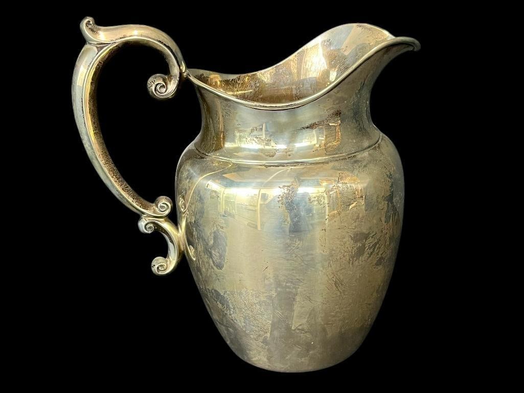 Gorham Sterling pitcher: Gorham Sterling pitcher. Approx. 9x8x5 inches. Approx. 19oz.