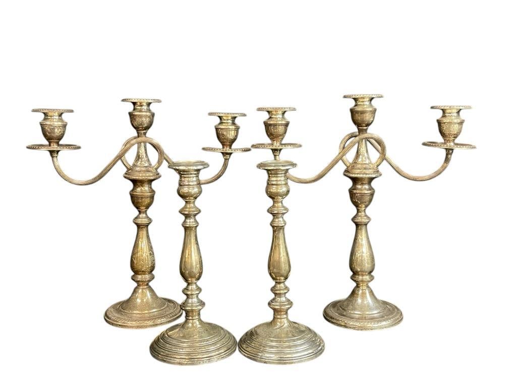 Weighted Sterling Candelabras and Candlesticks: Weighted Sterling Candelabras and Candlesticks. 4 pieces. Approx. 13x13x5 inches.