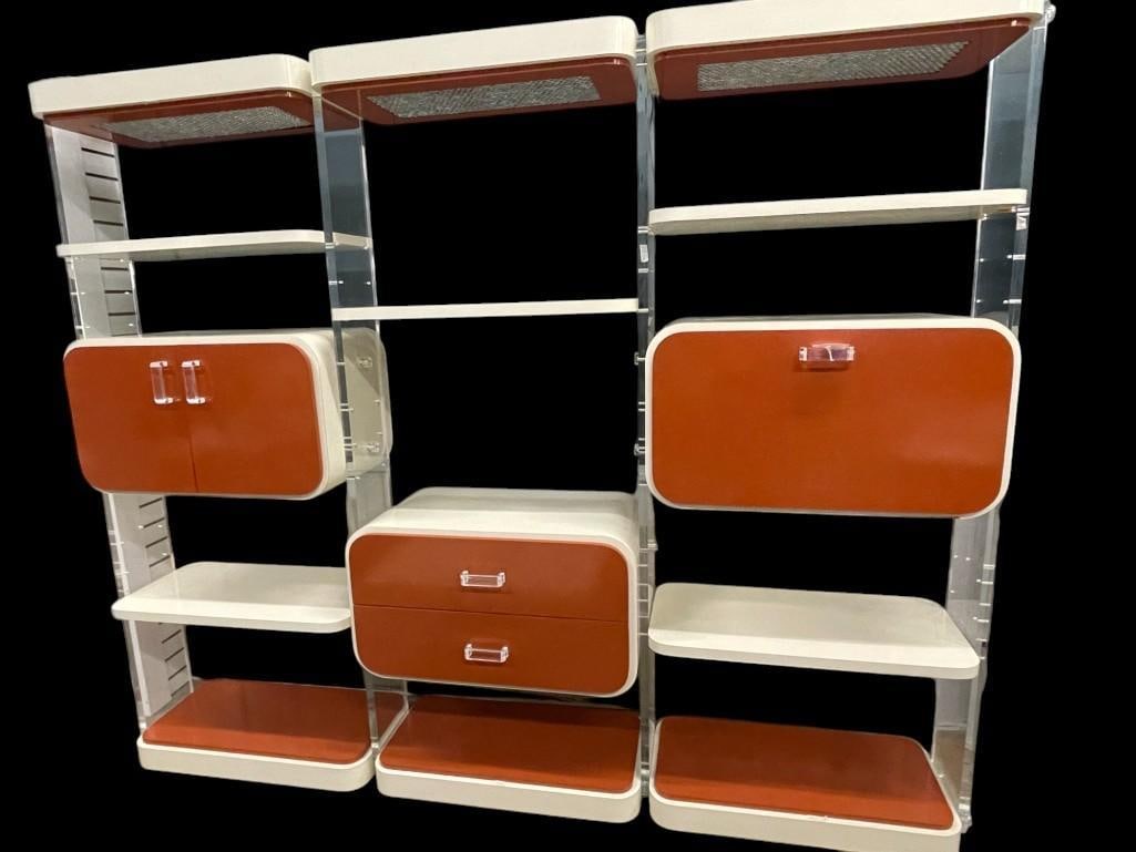Mid Century Lucite and Laminate Floating Shelf Wall Unit: Mid Century Lucite and Laminate Floating Shelf Wall Unit and matching laminate square coffee table. Approx. 8'6"x6'9"x17 inches.