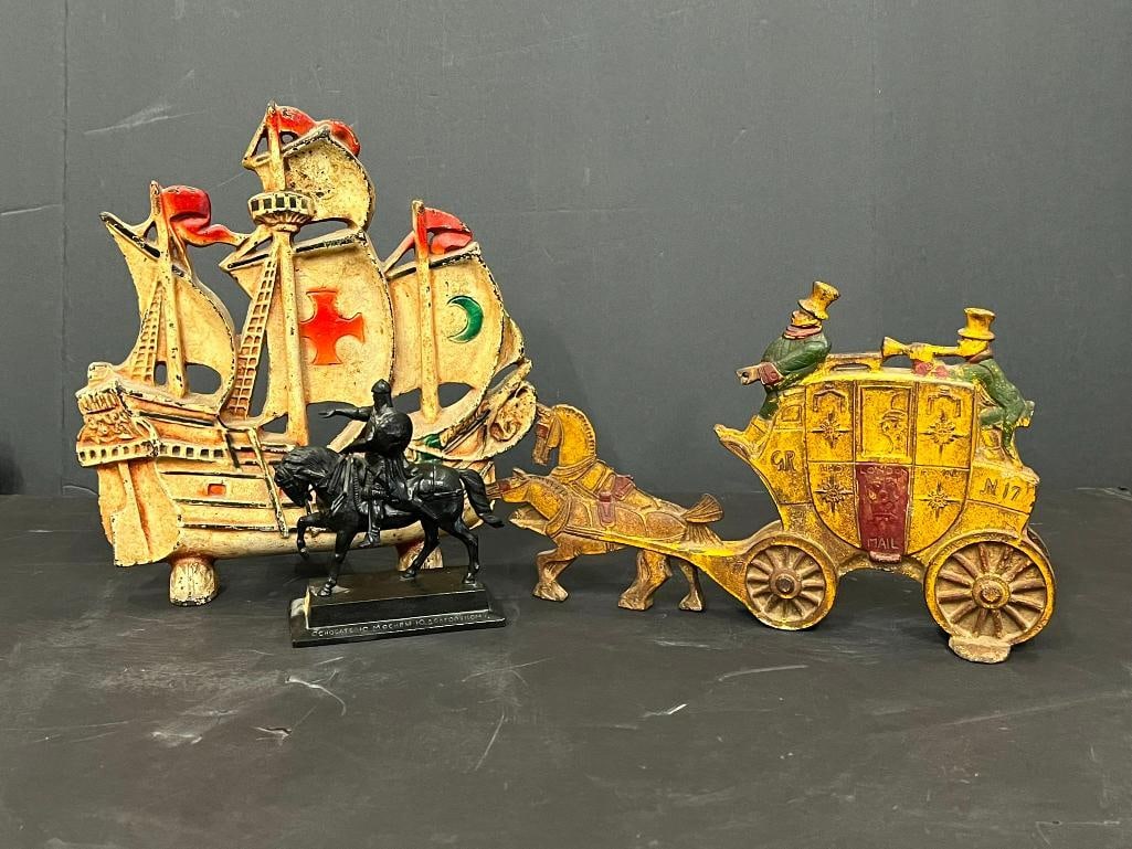 Cast Iron Doorstops and Knight on Horse Figure: Cast Iron Doorstops and Knight on Horse Figure. 3 pieces.