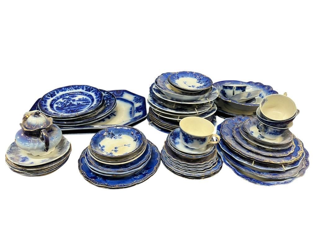 Large Group of Flo Blue Platters, Plates and more: Large Group of Flo Blue Platters, Plates and more. Approx. 64 pieces.
