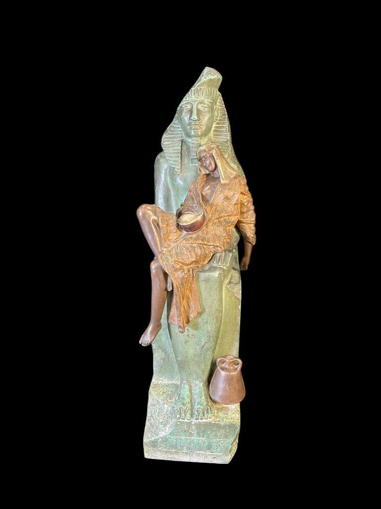 G. Leroux Egyptian Musician Asleep Statue: G. Leroux Egyptian Musician Asleep Statue. White Metal with Bronze Wash. Approx. 26x6.75x12 inches.