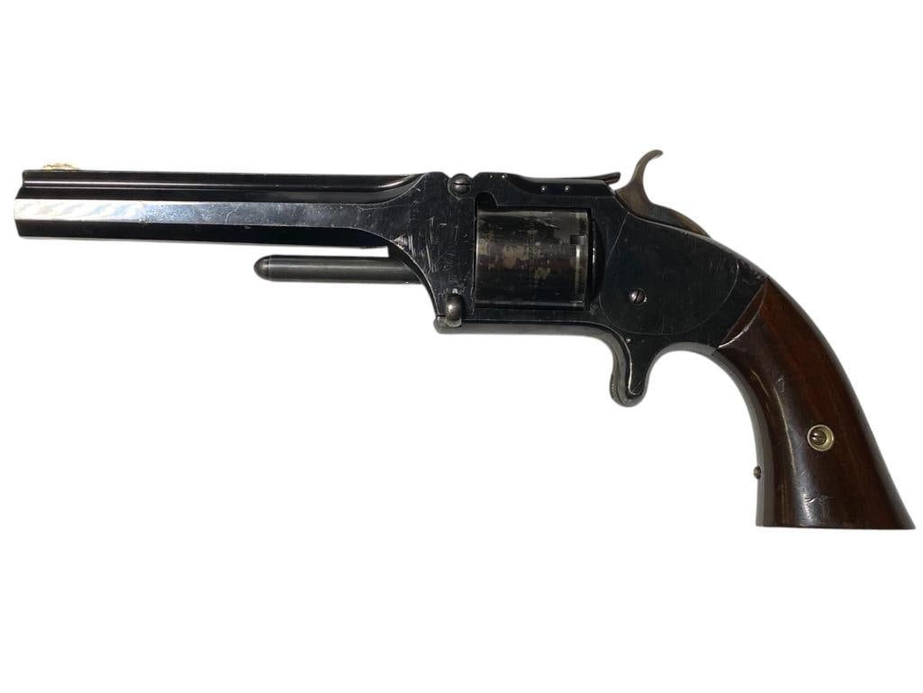Smith + Wesson Tip Up 32 Antique Black Powder Revolver: Smith + Wesson Tip Up 32 Antique Black Powder Revolver serial # 75762, 5" barrel, total approx. 10" l