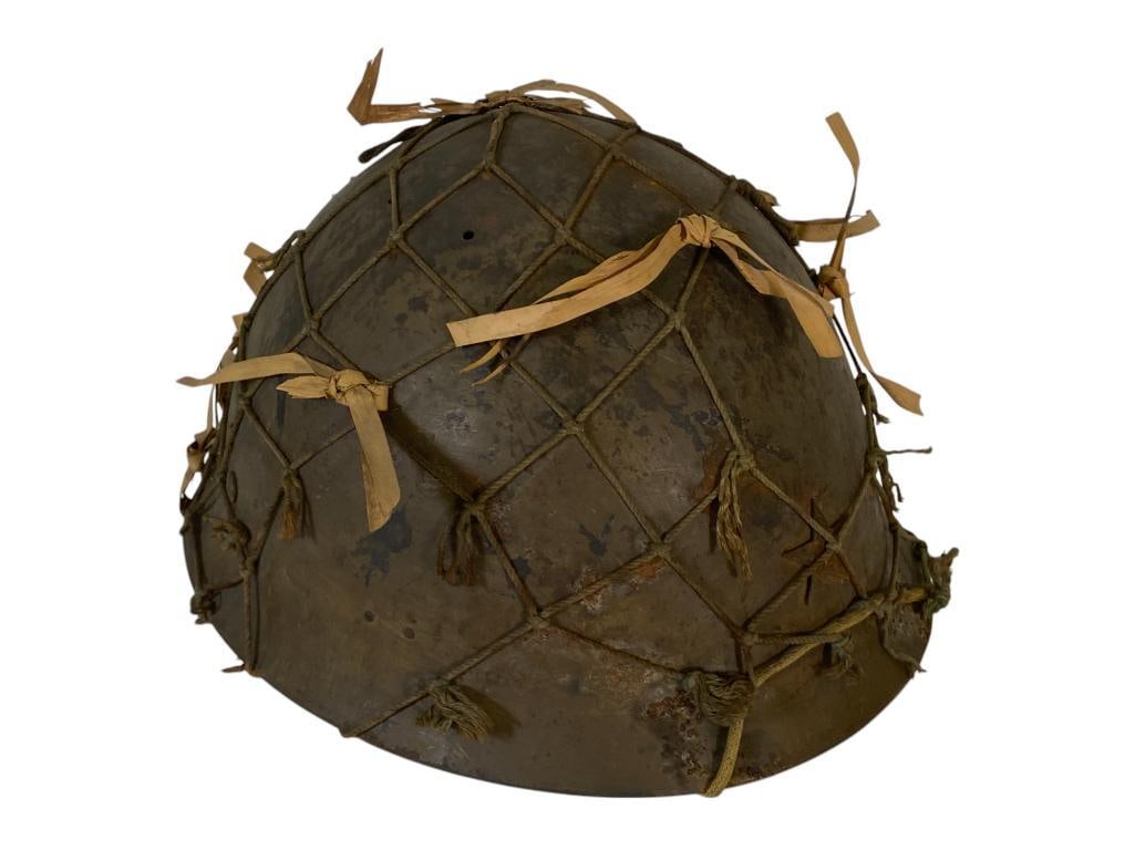 WWII Imperial Japanese Type 90 Combat Helmet: WWII Imperial Japanese Type 90 Combat Helmet with original liner, camo netting and cloth strap, approx. 10 7/8" diam and 6" h, Bring back war souvenir from Sgt. John J Gorney 3rd Battalion 152nd Infan