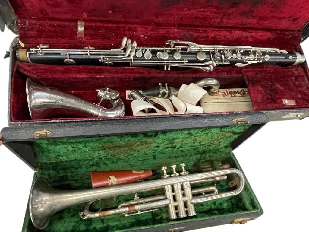 Bundy Baritone Clarinet and Euclid Trumpet: Bundy Baritone Clarinet in case and Euclid Trumpet. Approx. 35 x 10 x 6 inches.