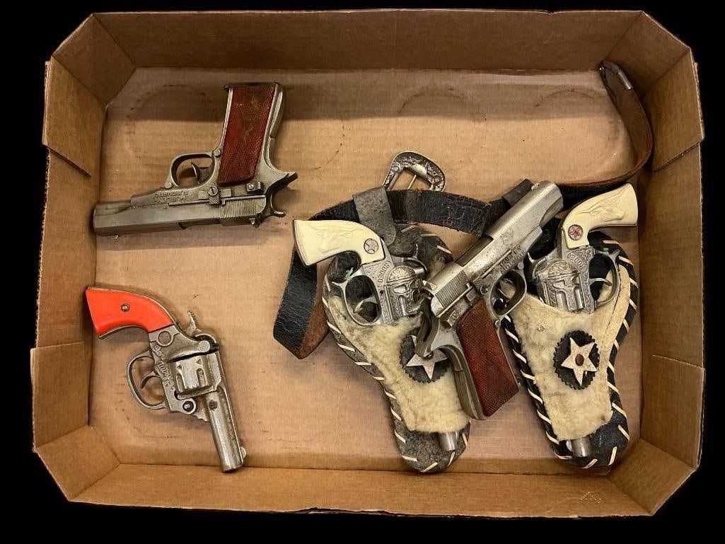 Group of Toy Cap Guns: Group of Toy Cap Gun, including 2 Hubley Automatic, Rodeo Western with Holsters and Gene Autry.