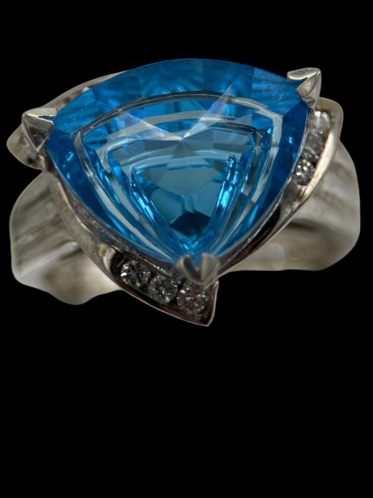 14k White Gold Blue Topaz and Diamonds Ring: 14k White Gold Fantasy Cut Blue Topaz and Diamonds Ring. Approx. size 6.5. Approx. 6.7 grams.