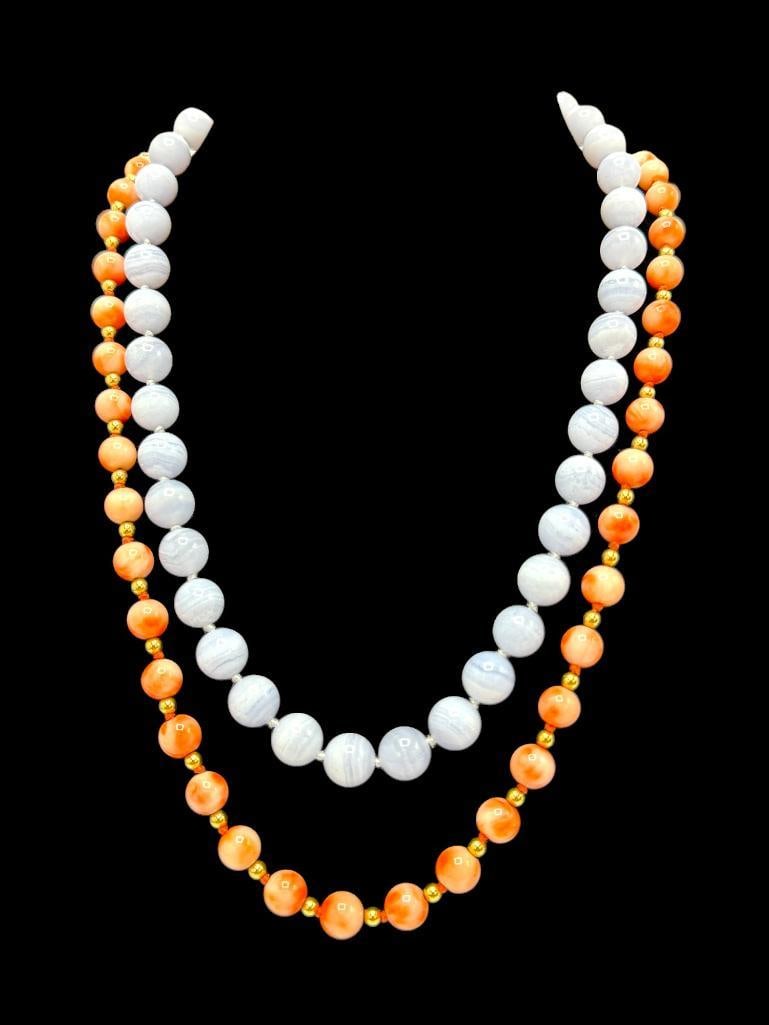 Banded Blue Agate Beads Necklace and Natural Coral Necklace: Banded Blue Agate Beads Necklace with 14k Gold Clasp and Natural Coral Necklace, Gold tests as 14k. 2 pieces. Agate approx. 19 inches. Coral approx. 26 inches.