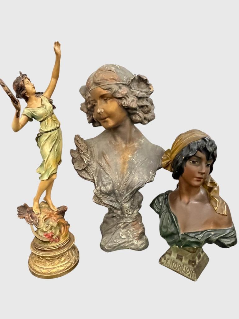Art Nouveau Busts and Statue: Art Nouveau Busts and Statue. 3 pieces. Standing figure is white metal. Busts are paint decorated porcelain. Statue approx. 24 x 7 x 7 inches.