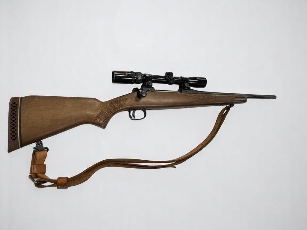 Savage 110E Series K 30-06 Bolt Action Rifle: Savage 110E Series K 30-06 Bolt Action Rifle. Serial C077452. Approx. 37 inches long.