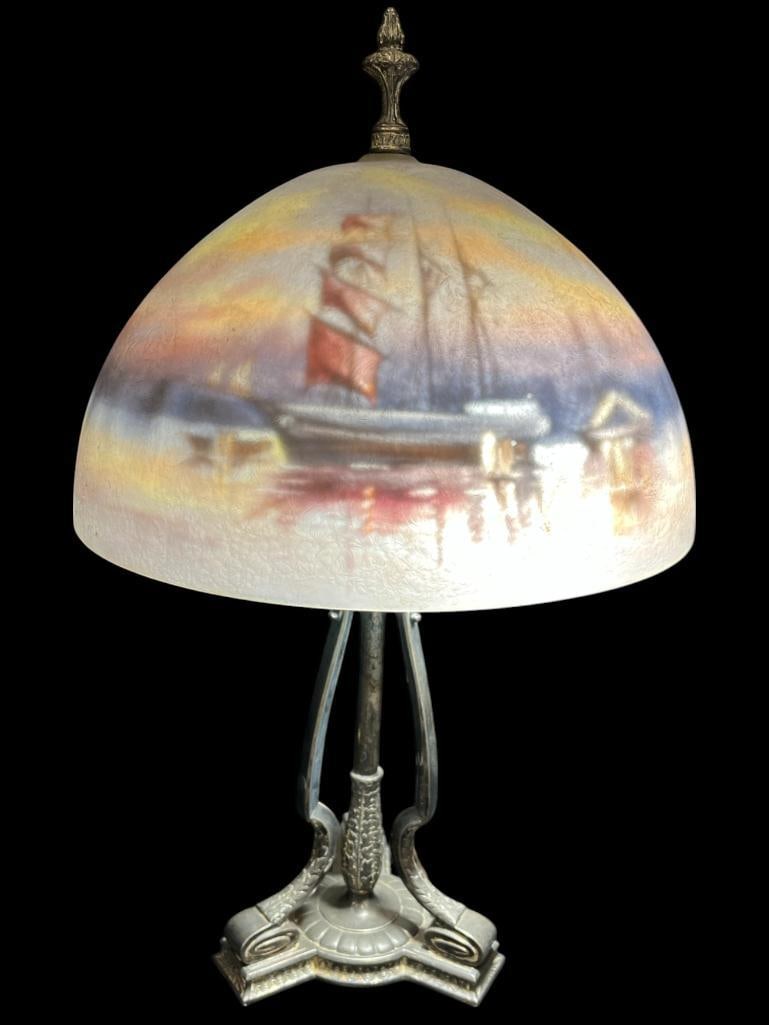Pairpoint Reverse Painted Lamp: Pairpoint reverse painted lamp with sailing ships. Signed by C. Durand. Base and shade marked Pairpoint. Approx. 22 x 14 x 14 inches.