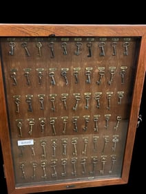Group of Skeleton Keys in Hotel Style Display Case