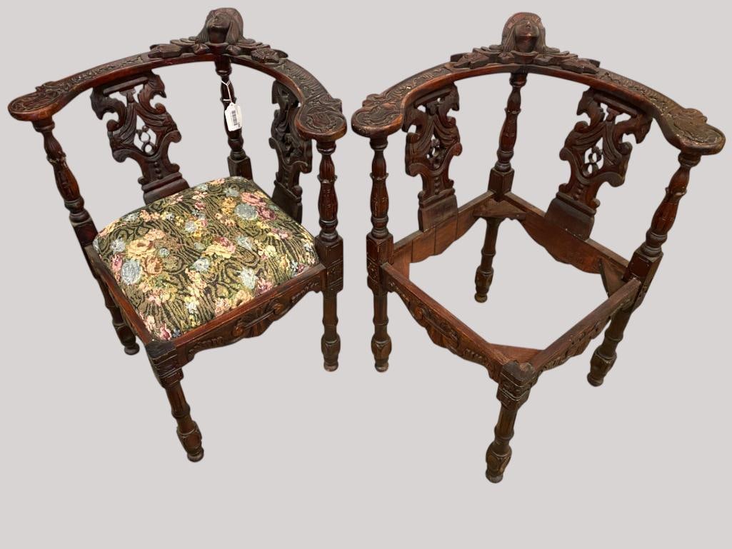 Pair of Carved Mahogany Corner Chairs: Pair of Carved Mahogany Corner Chairs. Approx. 35 x 23 x 23 inches.