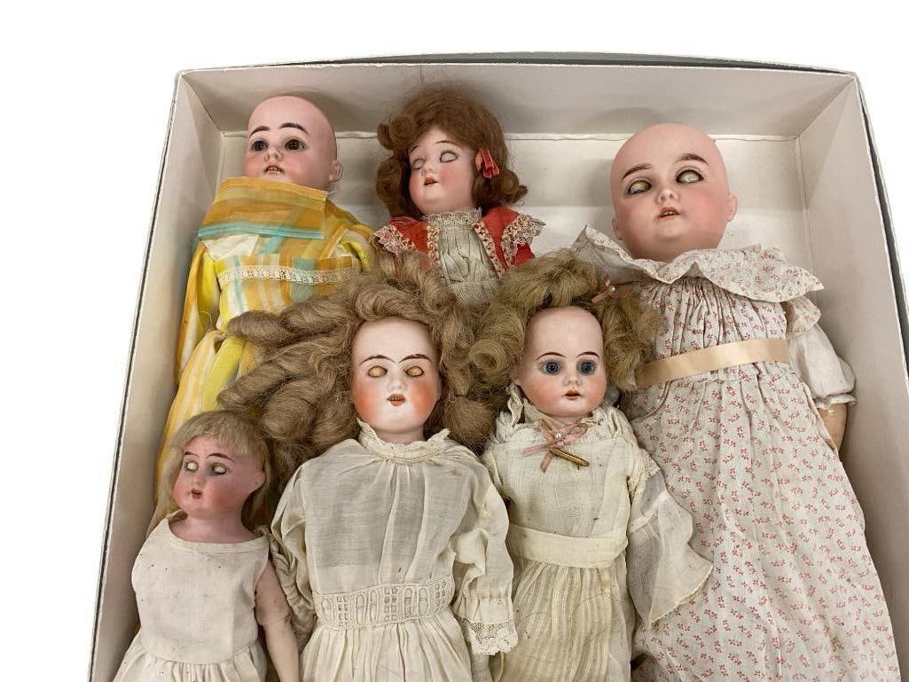 German Open Mouth Bisque Head Dolls: German Open Mouth Bisque Head Dolls and all Bisque Baby. 7 pieces.