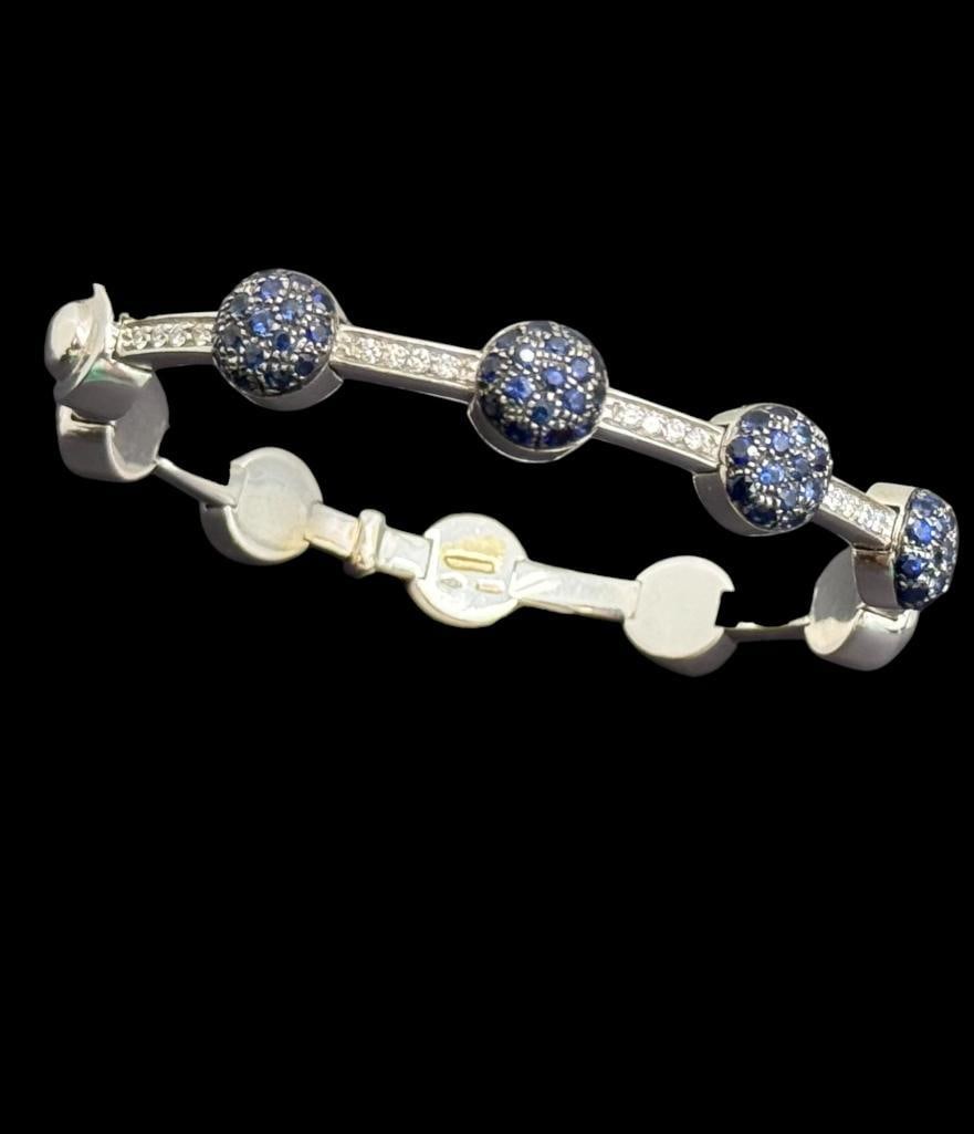 18k Gold Bracelet with Diamonds and Sapphires: 18k Gold Bracelet with Diamonds and Sapphires. Approx. 32 grams.