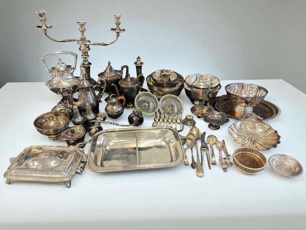 Group of mostly Silverplate Items: Group of mostly Silver Plated Items. Candlesticks, teapots etc. Approx. 30 pieces.