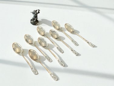 Sterling Silver Spoons and Cherub Figurine