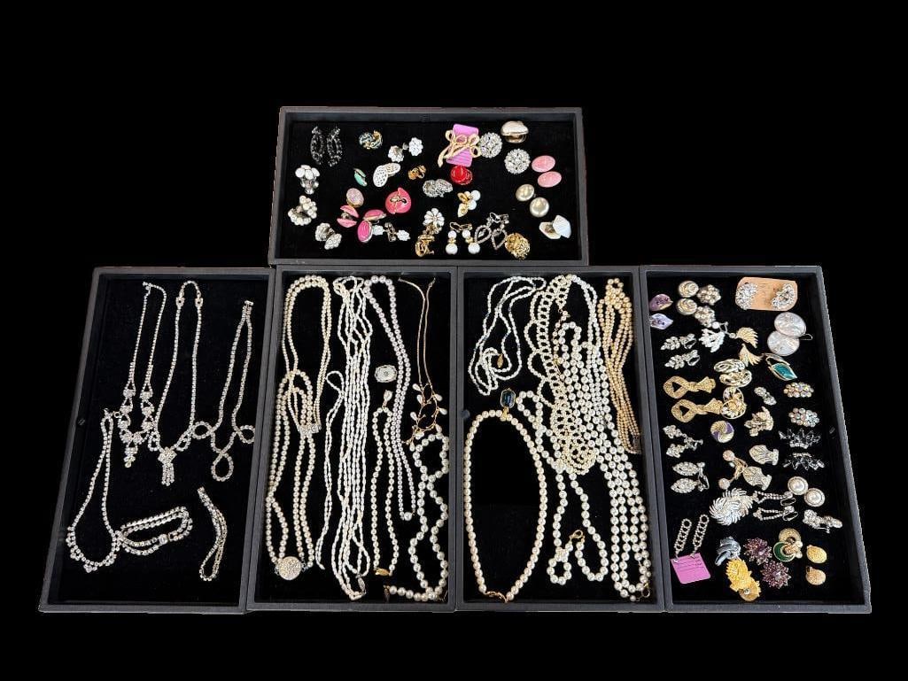 Large Group of Costume Jewelry: Large Group of Costume Jewelry Earrings, Necklaces, Pearls and more.