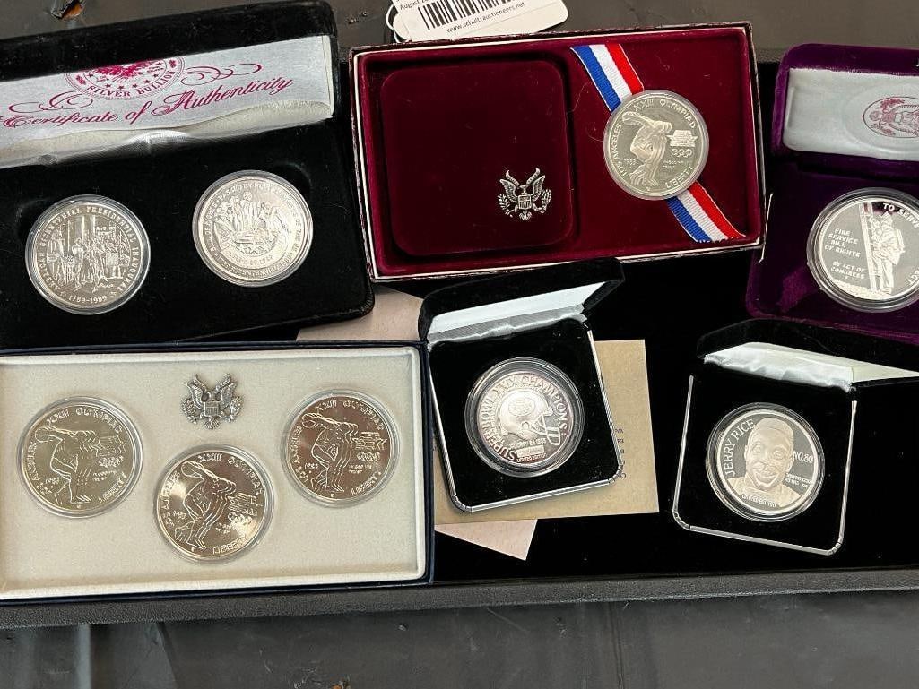 9 Silver Commemorative Coins, Olympics etc: 9 Silver Commemorative Coins including 1983 Olympics, benjamin Franklin Fire Service Bill of Rights, San Francisco 49ers Superbowl XXIX Champions, 1993 Jerry Rice Environment and Bicentennial silver r