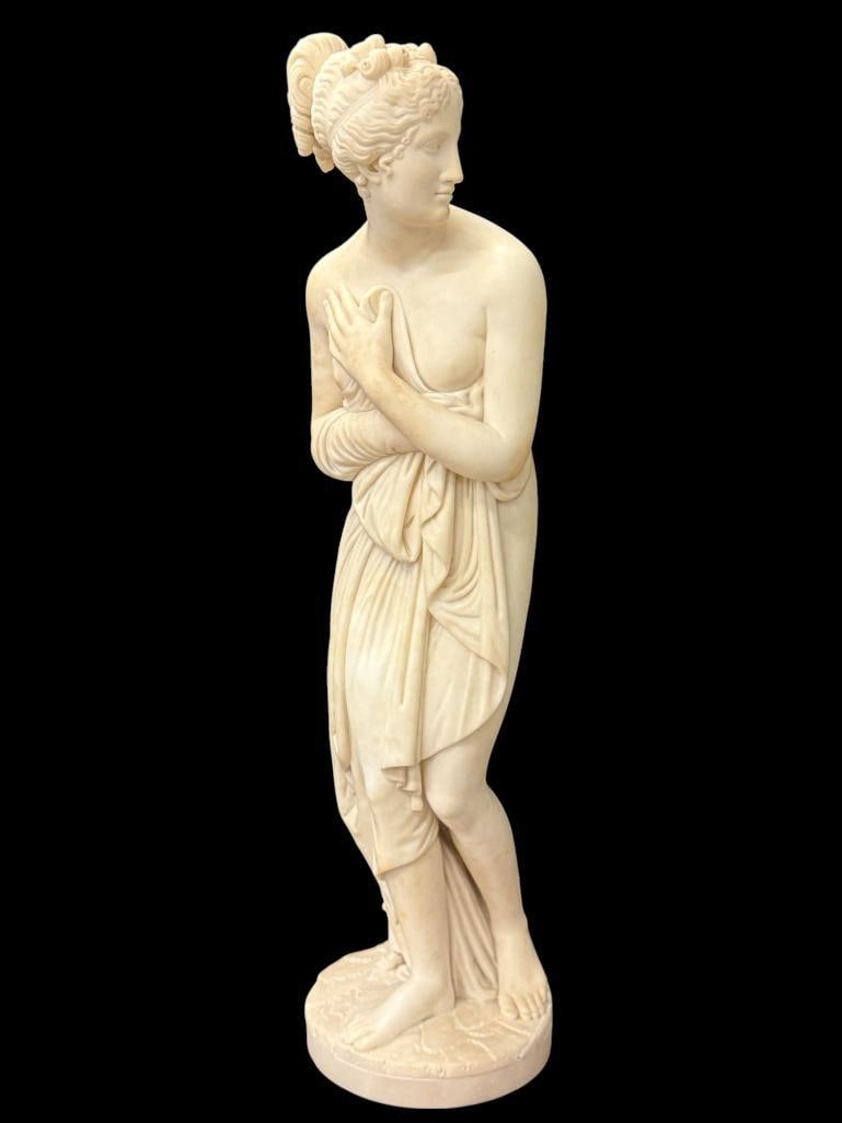 Marble Statue of a Nude Woman: Marble Statue of a Nude Woman. Approx. 32 x 9 x 9 inches.