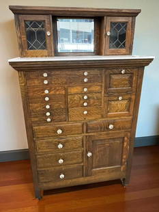 Antique 18 Drawer Oak Dental Cabinet: Antique 18 Drawer Oak Dental Cabinet with Porcelain top. Approx. 59 x 36 x 16 inches.