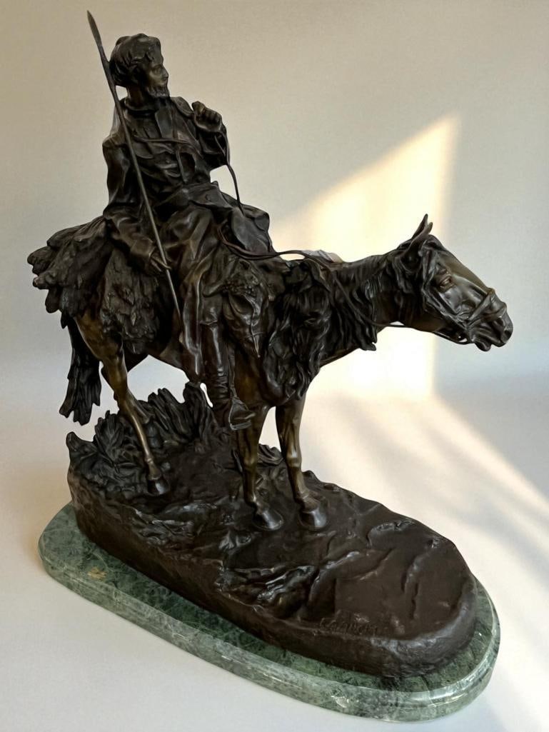 E. Nahcepe signed Bronze Man on Horseback: E. Nahcepe signed Bronze Man on Horseback, on Marble base. Approx. 20 x 20 x 10 inches.