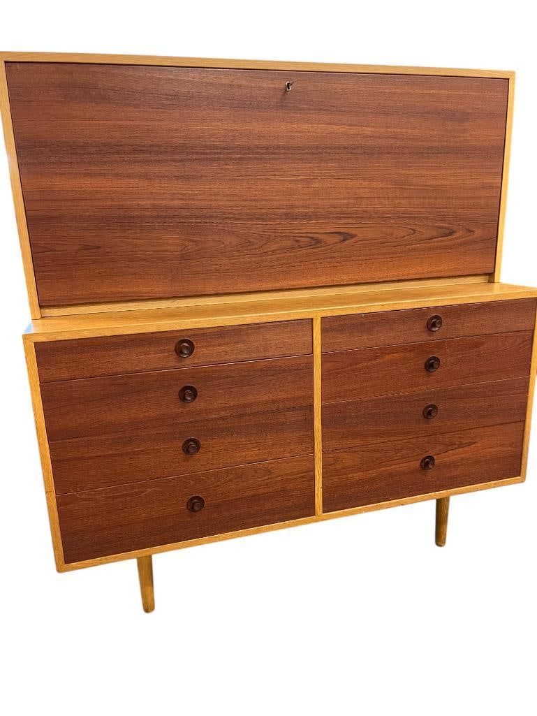 Borge Mogensen Two Part Cabinet: Borge Mogensen Two Part Cabinet, 1960's, Oak and Teak. Manufactured by Karl Andersson's, Sweden. Top approx. 23 x 53 x 14 inches. Bottom approx. 33 x 53 x 21 inches.