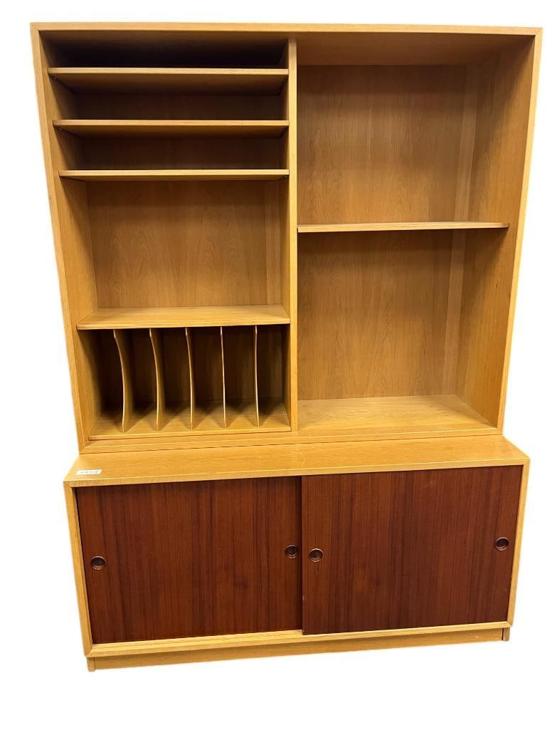 Borge Mogensen Two Part Cabinet: Borge Mogensen Two Part Cabinet, 1960's, Oak and Teak. Manufactured by Karl Andersson's, Sweden. Top approx. .46 x 53 x 14 inches. Bottom approx. 26 x 53 x 21 inches.