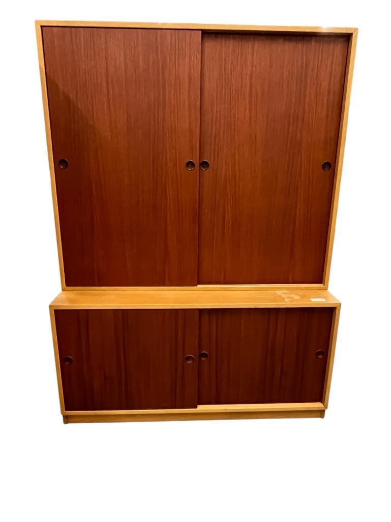 Borge Mogensen Two Part Cabinet: Borge Mogensen Two Part Cabinet, 1960's, Oak and Teak. Manufactured by Karl Andersson's, Sweden. Top approx. .46 x 53 x 14 inches. Bottom approx. 26 x 53 x 21 inches.