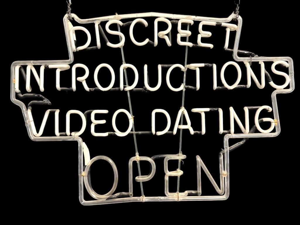 Discreet Introductions Video Dating Neon Sign: Discreet Introductions Video Dating Neon Sign. No transformer. Approx. 28 x 42 inches.