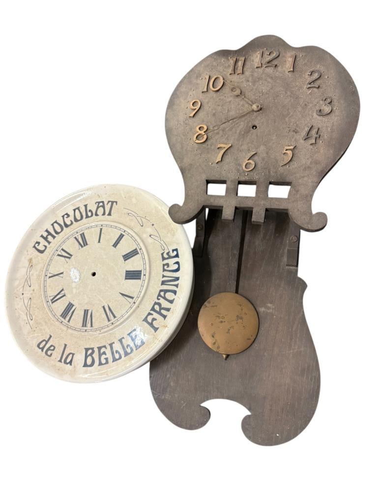 Sessions Ramona Mission Style Oak Wall Clock: Sessions Ramona Mission Style Oak Wall Clock. c.1908. and Choclat clock face. Approx. 31 x 15 inches.
