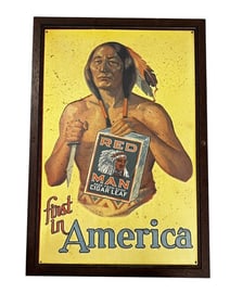 Red Man Embossed Metal Sign