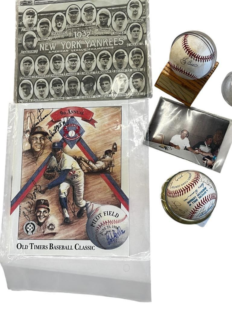 Autographed Baseballs Yogi Berra, Tug McGraw etc: Autographed Baseballs including Yogi Berra. Old Timers Baseball Classic autographed ball by Tug McGraw, Bob Feller, Brooks Robinson and more.