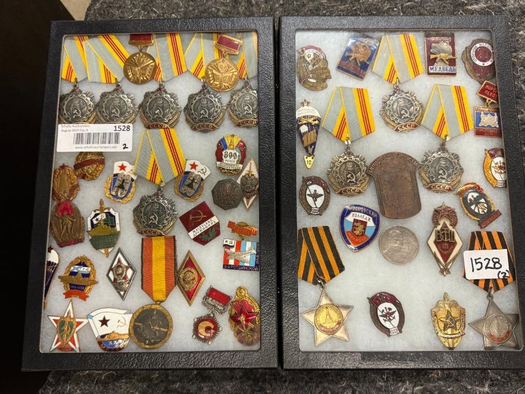 48 Soviet Military Medals and Badges: 48 Soviet Military Medals including Order of Labor Glory, Badge of the MVD Academy, Honorary Firefighter of the USSR, Railroad Traffic Controller,Paratroopers Badge and more.