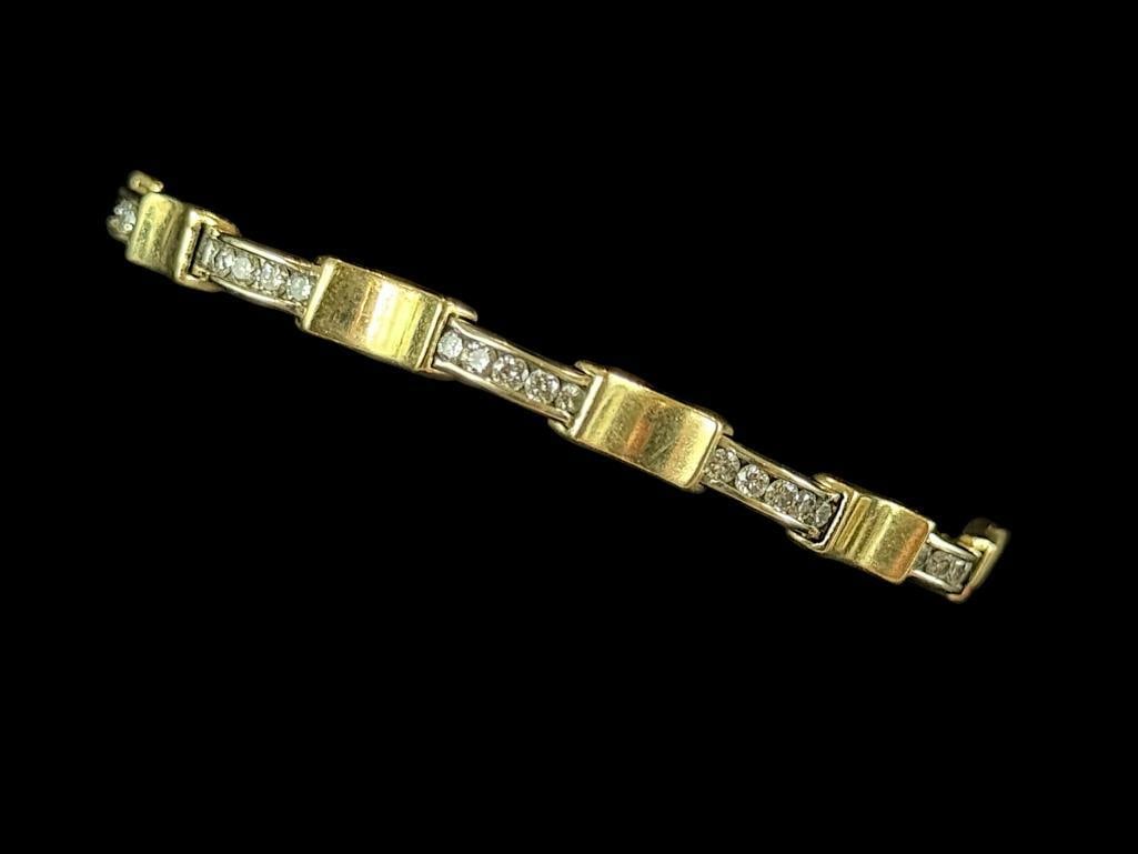 14k Gold Bracelet with Diamonds: 14k Gold with Diamonds Bracelet. Approx. 15.5 grams. Approx. 7 inches.