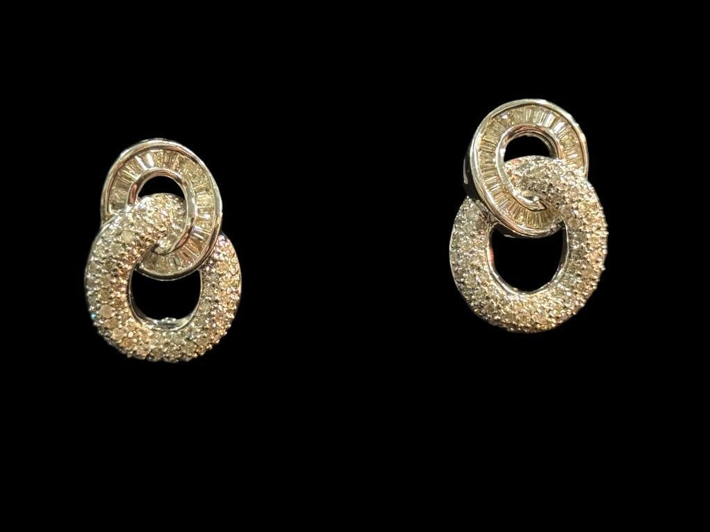 18k Gold and Diamond Earrings: 18k Gold and Diamond Earrings. Approx. 14.2 grams. Approx. 1 x .75 inches.