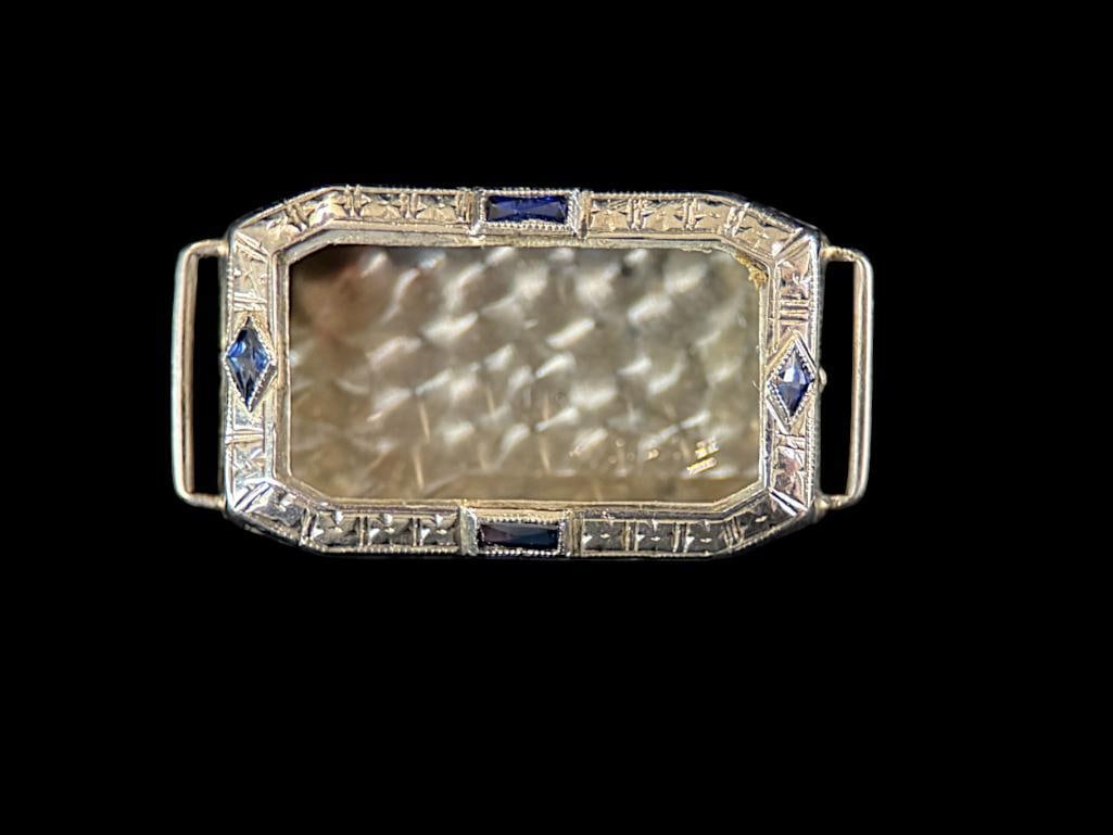 18k Gold Watch Case: 18k Gold Watch Case with small stones. Approx. 4.7 grams. Approx. .75 x 1 inch.