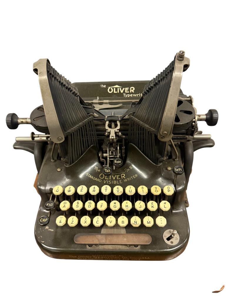 The Oliver No. 5 Standard Visible Typewriter: The Oliver No. 5 Standard Visible Typewriter. Approx. 11 x 14 x 18 inches.